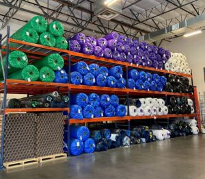 No Limit Turf's warehouse full of turf inventory for contractors